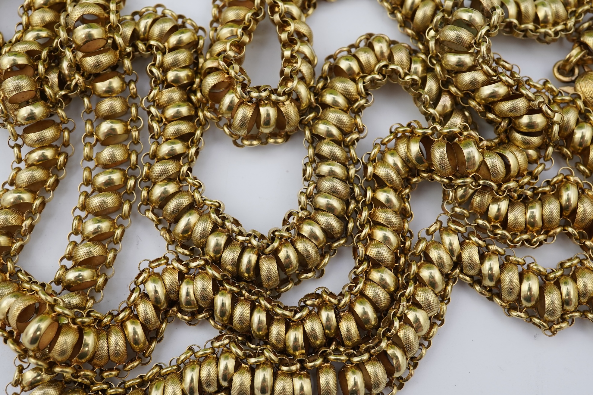 A gold long guard chain, 19th century